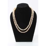 Freshwater pearl necklace with silver filigree clasp,