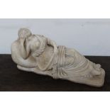 19th century Continental carved white marble sculpture after the antique - a semi-clad reclining