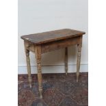 Small 19th century pine table with frieze drawer, on turned legs, 75cm wide x 38cm deep,
