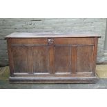18th century oak coffer with plank top and four-panel front, on plinth base,