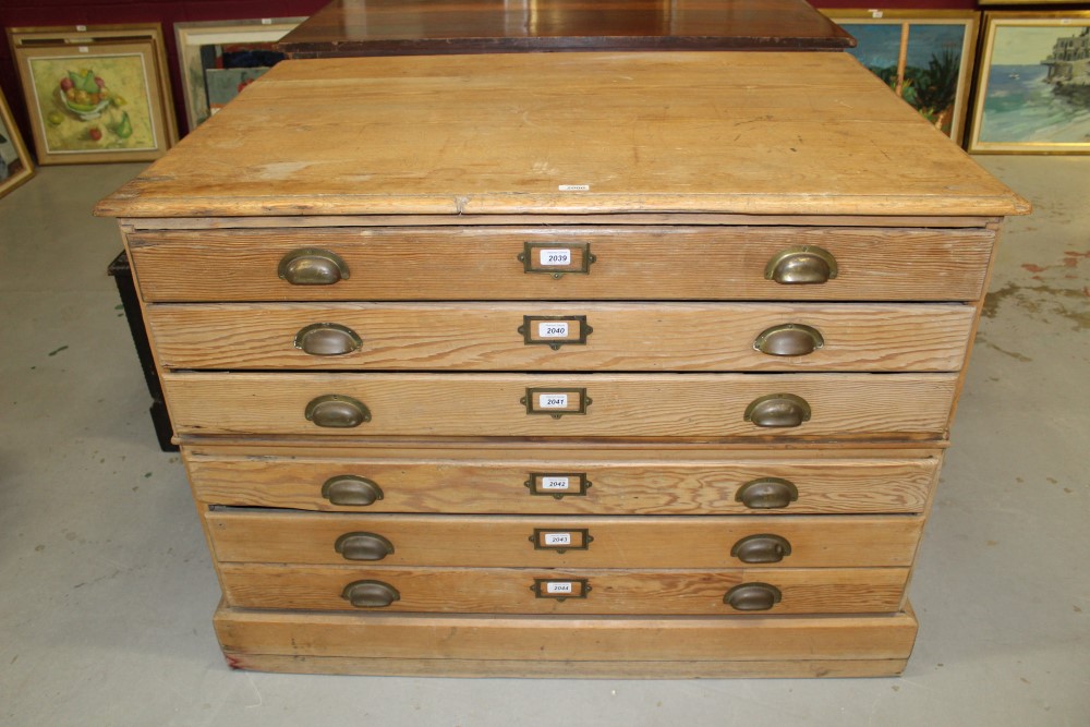 Early 20th century pine plan chest with six drawers and brass cup handles,