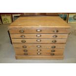 Early 20th century pine plan chest with six drawers and brass cup handles,