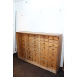Large antique pine bank of drawers,
