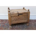 Antique Eastern carved hardwood box stool with hinged lid and relief geometric carved panels