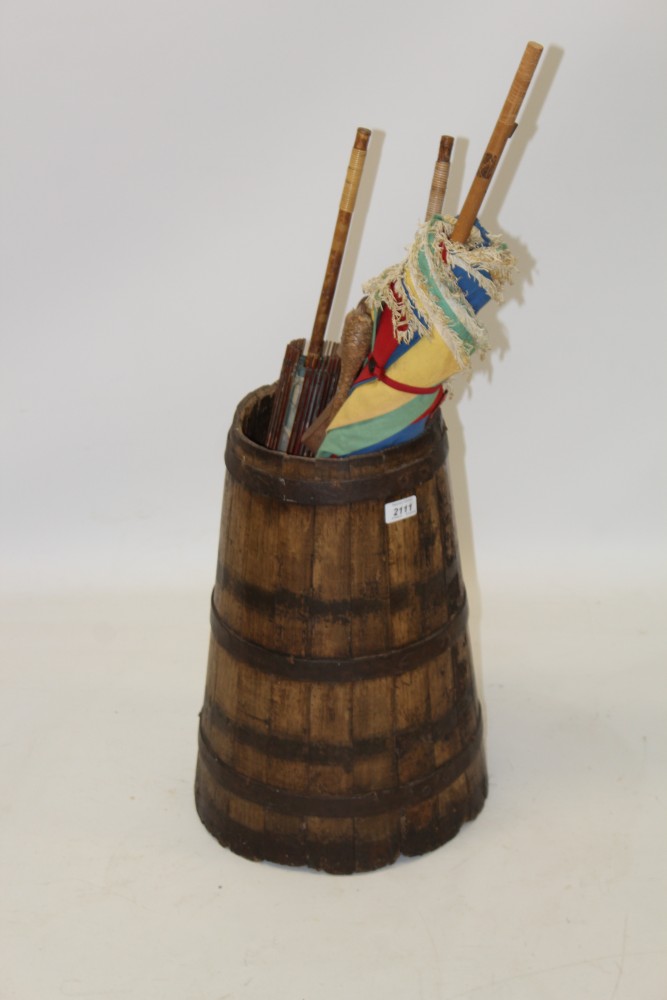 Antique coopered barrel, together with group of sticks,