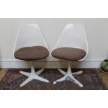 Set of four 1960s stylish white fibreglass revolving dining chairs by Arkana on X-formed base