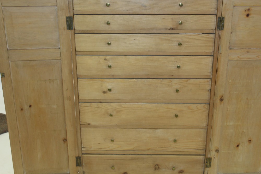 Late 19th century pine Wellington chest with eight graduated drawers enclosed by panelled doors, - Image 3 of 3