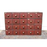 19th century painted pine bank of twenty drawers with bun handles,