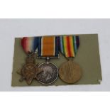 First World War 1914 - 1915 Star trio - comprising 1914 - 1915 Star, War and Victory medals,