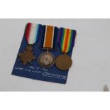 First World War 1914 - 1915 Star trio - comprising 1914 - 1915 Star, War and Victory medals,