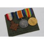 First World War 1914 - 1915 Star trio - comprising 1914 - 1915 Star, War and Victory medals,