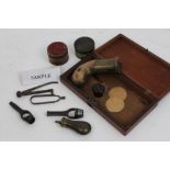 Collection of 19th century gun accessories - including pistol flask, bullet mould, wadcutters,