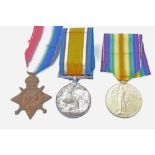 First World War 1914 - 1915 Star trio - comprising 1914 - 1915 Star, War and Victory medals,