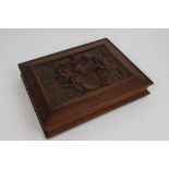 19th century German carved walnut presentation box with ornate carving of Arms to lid and silver