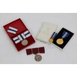 Elizabeth II Coronation medal, together with Elizabeth II Silver Jubilee medal in box of issue,