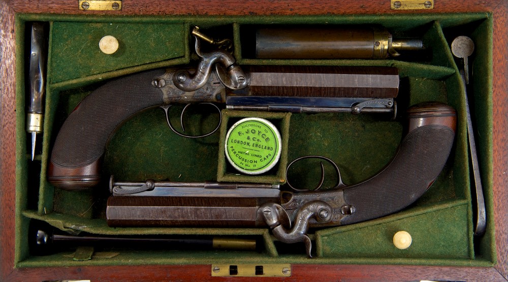 Fine pair of George IV Officers' cased percussion 'Man Stopper' 17 bore belt pistols, by W.