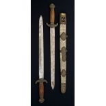 19th century Chinese Shuang Jian double sword set with brass mask guards, fluted wooden grips,