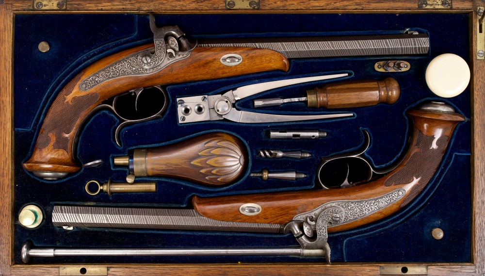 Fine pair of mid-19th century German percussion target pistols in original close-fitting case,