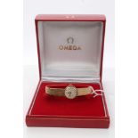 Omega ladies' gold (9ct) wristwatch on gold bark-effect strap,