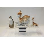 Selection of Russian porcelain animal ornaments - including penguins, bears, giraffe,