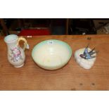 Three pieces of Clarice Cliff - bowl with floral decoration,