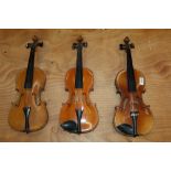 Three old violins - one stamped - Stainer and one labelled - Boosey & Hawkes