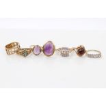 Group of seven gold gem set dress rings