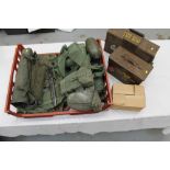 Two ammunition cases, together with a bayonet, camouflage netting,