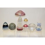 Group of eight paperweights including iridescent and millifiori