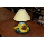 Moorcroft pottery lamp with sunflower decoration,