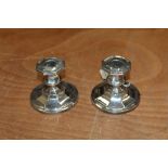 Pair of Edwardian silver dwarf candlesticks (Sheffield 1906) and a late Victorian silver rose bowl