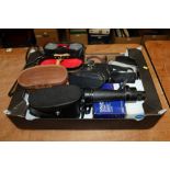 Seven pairs of binoculars in fitted cases,