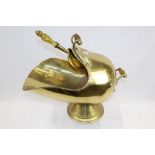 Victorian brass coal scuttle of helmet form with cut glass amber handles,