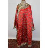 19th century Chinese robe, padded red silk ground with allover embroidered butterflies,