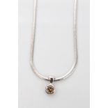 White gold (9ct) cinnamon-coloured diamond single stone pendant, approximately 0.