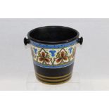 Gouda pottery wine cooler of tapered cylindrical form with twin handles with floral geometric band