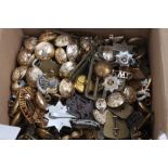 One box containing extensive collection of British Military cap badges and buttons - mainly