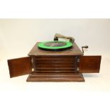 Early 20th century 'His Master's Voice' wind-up gramophone in an oak case