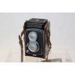 Yashicaflex TLR camera in leather case