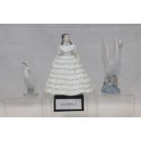 Lladro goose with basket of goslings, one other Lladro goose, Nao swan with outspread wings,