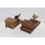 Two 1930s decorative bird cigarette dispensers