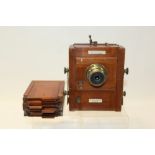Victorian Lancaster 'The International' patent plate camera with brass lens and three plate holders