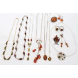 Group of amber jewellery - to include gold (9ct) amber necklace and a quantity of silver and white