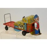 Tinplate clockwork Train Porters' cart with bell and Made in Gt.