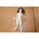 Doll - Victorian porcelain headed doll made in Germany A 7½H marks to rear of head,