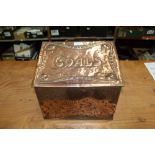 Edwardian Arts and Crafts beaten copper coal box, the sloping cover embossed 'coals',