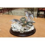 Country Artists sculpture of Wolves - An Early Thaw,