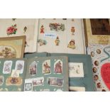 Mixed ephemera - including two albums - one containing large and small scraps, clowns, flowers,