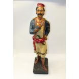 Large 19th century carved and painted wooden shops' advertising figure of a Turk in costume,