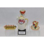 Two Clarice Cliff preserve pots, Carlton Ware toast rack,